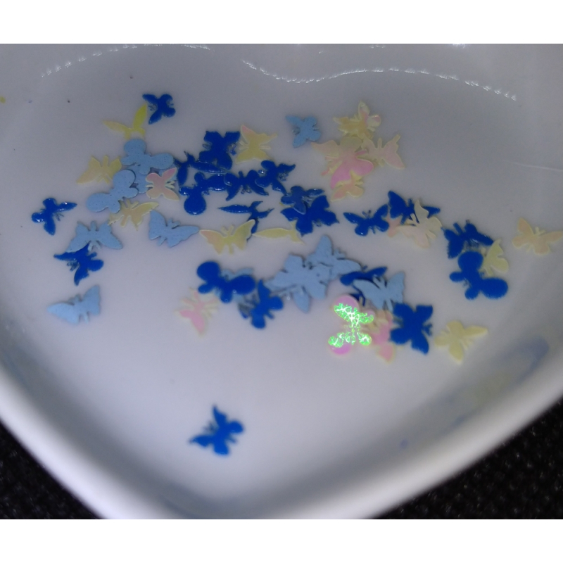 vlindertjes 0,5 cm. blauw tintjes